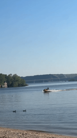 Jet skier enjoys calm waters at Russian beach