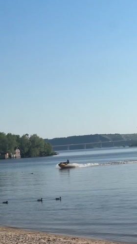 Jet skier enjoys calm waters at Russian beach