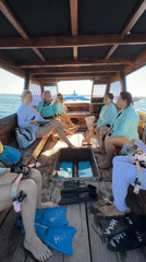 Women prepare for snorkeling trip aboard 'Princess Mononoke' boat