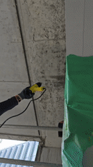 Construction crew performs ceiling maintenance, mold remediation work