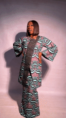 Woman in traditional dress photographed smiling in Jos, Nigeria