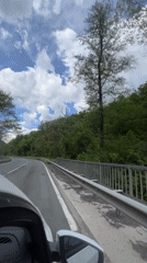 Driver records roadside scenery from moving car in Kamchia