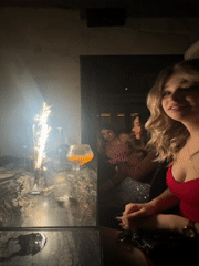 Women celebrate with sparkler at Mexico City restaurant