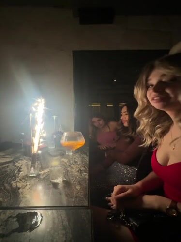 Women celebrate with sparkler at Mexico City restaurant