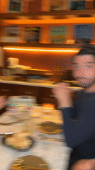 Late night dining group captured at New York restaurant