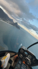 Helicopter captures aerial views of Rio coastline and mountains