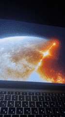 Laptop displays cosmic animations and CGI scenes in Batumi