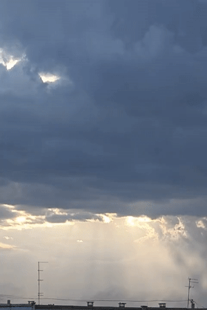 Shifting clouds and sunbeams over Rubtsovsk on a dramatic afternoon