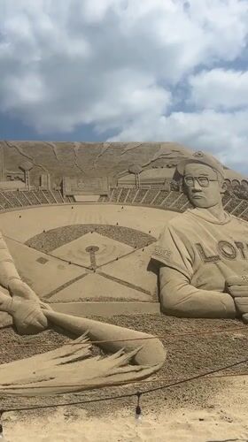 Baseball-themed sand sculptures draw visitors at Haeundae Beach