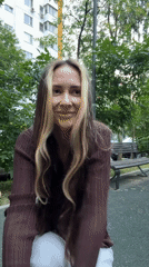Laughing and moving outdoors in Moscow on a summer day