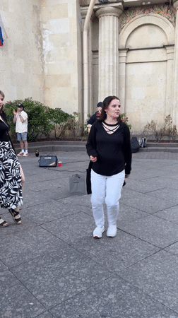 Street musicians perform at Saint Petersburg plaza during evening