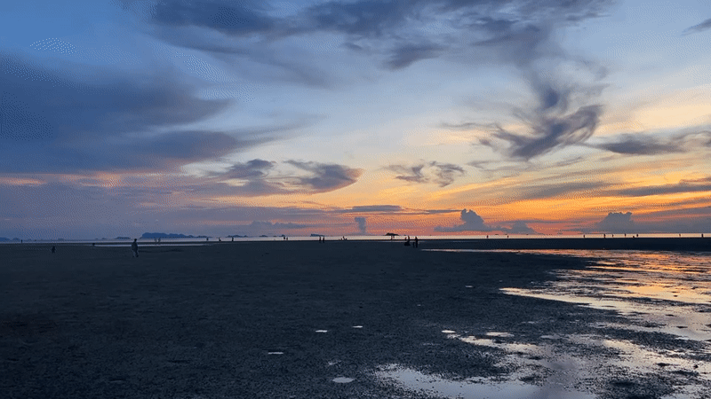 Koh Phangan beach at golden hour, sky and sea in full color