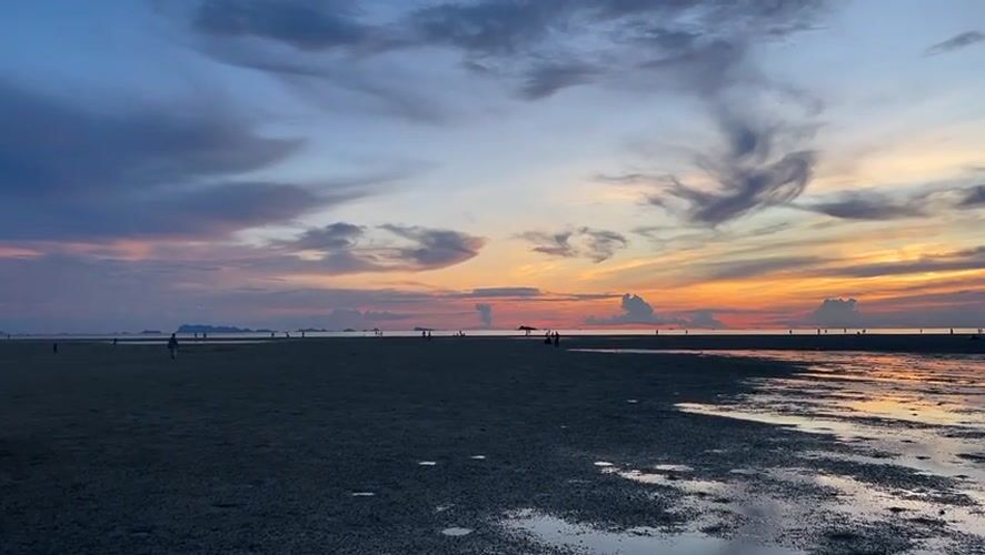Koh Phangan beach at golden hour, sky and sea in full color