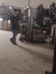 Inside a busy metalworking workshop in Belimbing, Indonesia