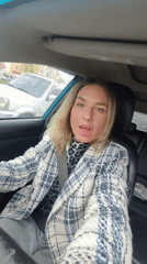 Woman takes selfies in car in Petropavlovsk-Kamchatsky
