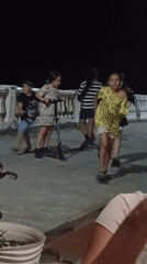Family evening gathering with children, baby, dog on Sochi promenade
