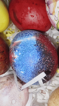 Decorated Easter eggs displayed in basket in London