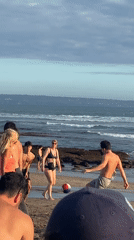 Morning beach volleyball and recreation in North Kuta
