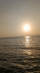 Sunset hour at a quiet Indonesian fishing village harbor