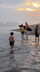 Sunset beach activities draw crowds across Bali tourist areas