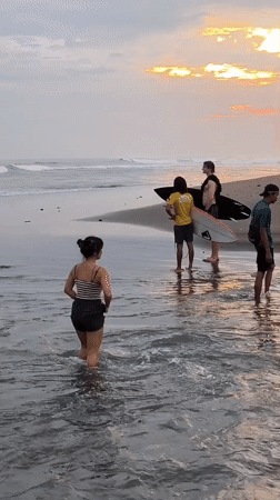 Sunset beach activities draw crowds across Bali tourist areas