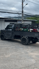 Woman documented moving through parking area in Baan Bo Phut