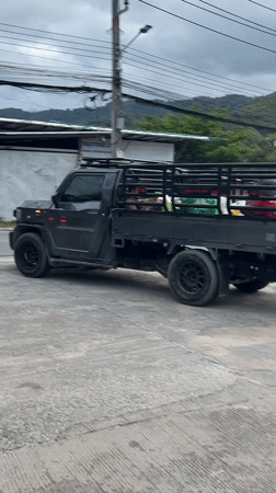 Woman documented moving through parking area in Baan Bo Phut
