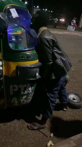 Nighttime tuk-tuk stop in Bukuru, Nigeria