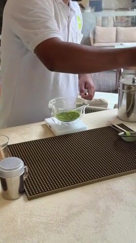 Early morning matcha preparation captured in Si Sunthon, Thailand