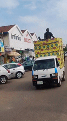Ordinary street life documented in West African town