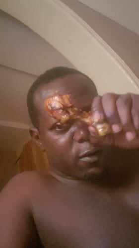 Man enjoys chicken meal in northern Nigeria