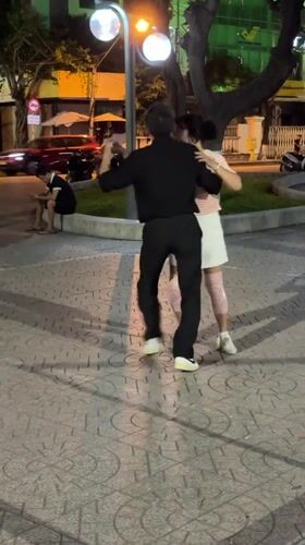 Friday night on Nha Trang's promenade — fountains, dancing, and street life