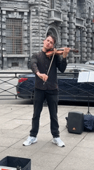 Street performers active near Saint Petersburg church square