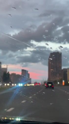 Rainy drive captured on Kazan highway during evening storm