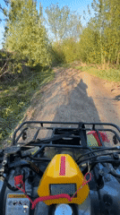 ATV rider travels dirt roads in rural Perm