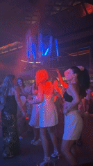 Valencia nightclub dance floor, colored lights and movement