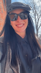 Woman takes selfies in fitting room in Chaikovsky