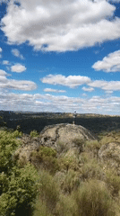 Rocky hilltop views across the scrubland of Sobradillo, Spain