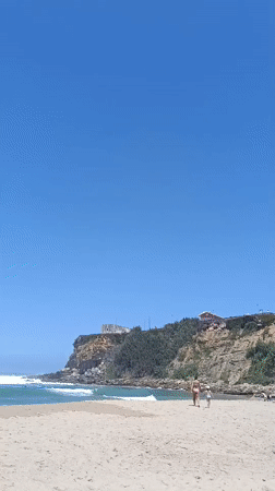 Sunny beach day at São João das Lampas, Portugal