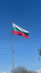 Bulgarian flag waves in clear skies in Ravno pole