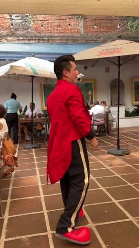 Clown entertains diners at decorated restaurant event in Cuernavaca