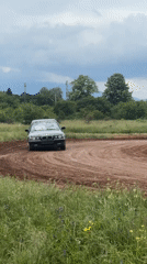 BMW drivers practice maneuvers on dirt track in Bulgaria