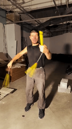 Nunchuck and juggling practice in a raw Kazakhstani warehouse