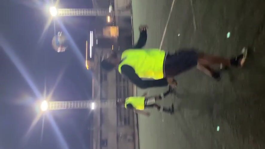 Soccer practice session on illuminated Accra field