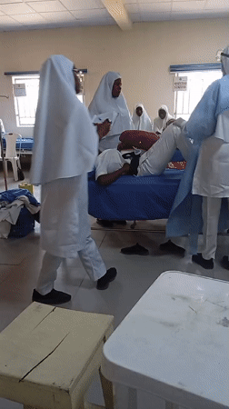Medical staff treat patient in Maiduguri hospital room