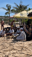Traditional ceremony observed on Kuta Selatan beach, Indonesia