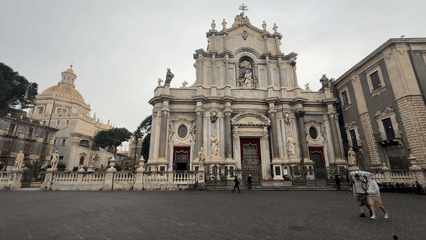 Early morning fish market operates in rainy Catania