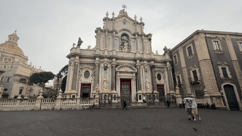 Early morning fish market operates in rainy Catania