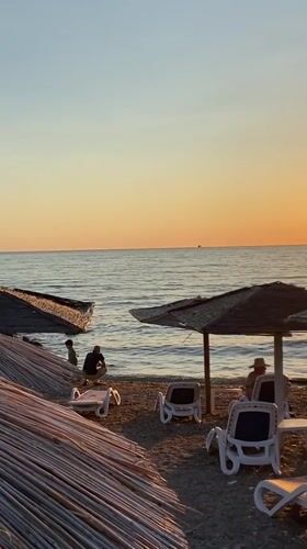 Sunset in Bar: live violin, empty beach, Adriatic dusk