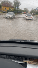 Flooding and dramatic skies documented during afternoon incident